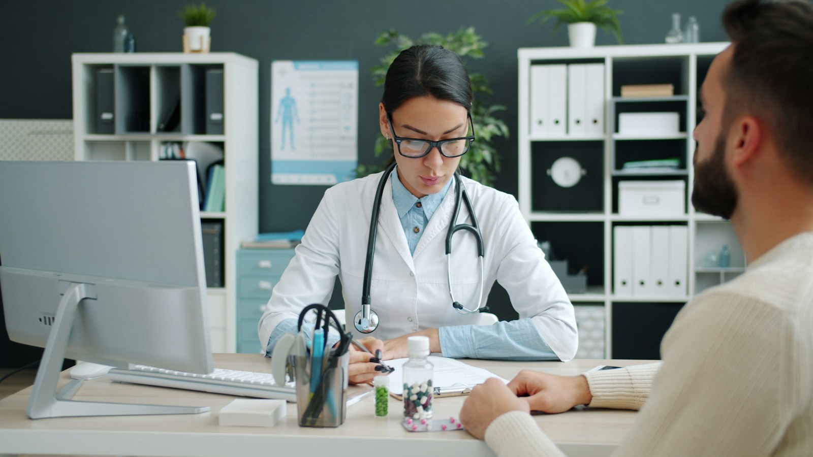 Doctor speaking with a patient during an appointment