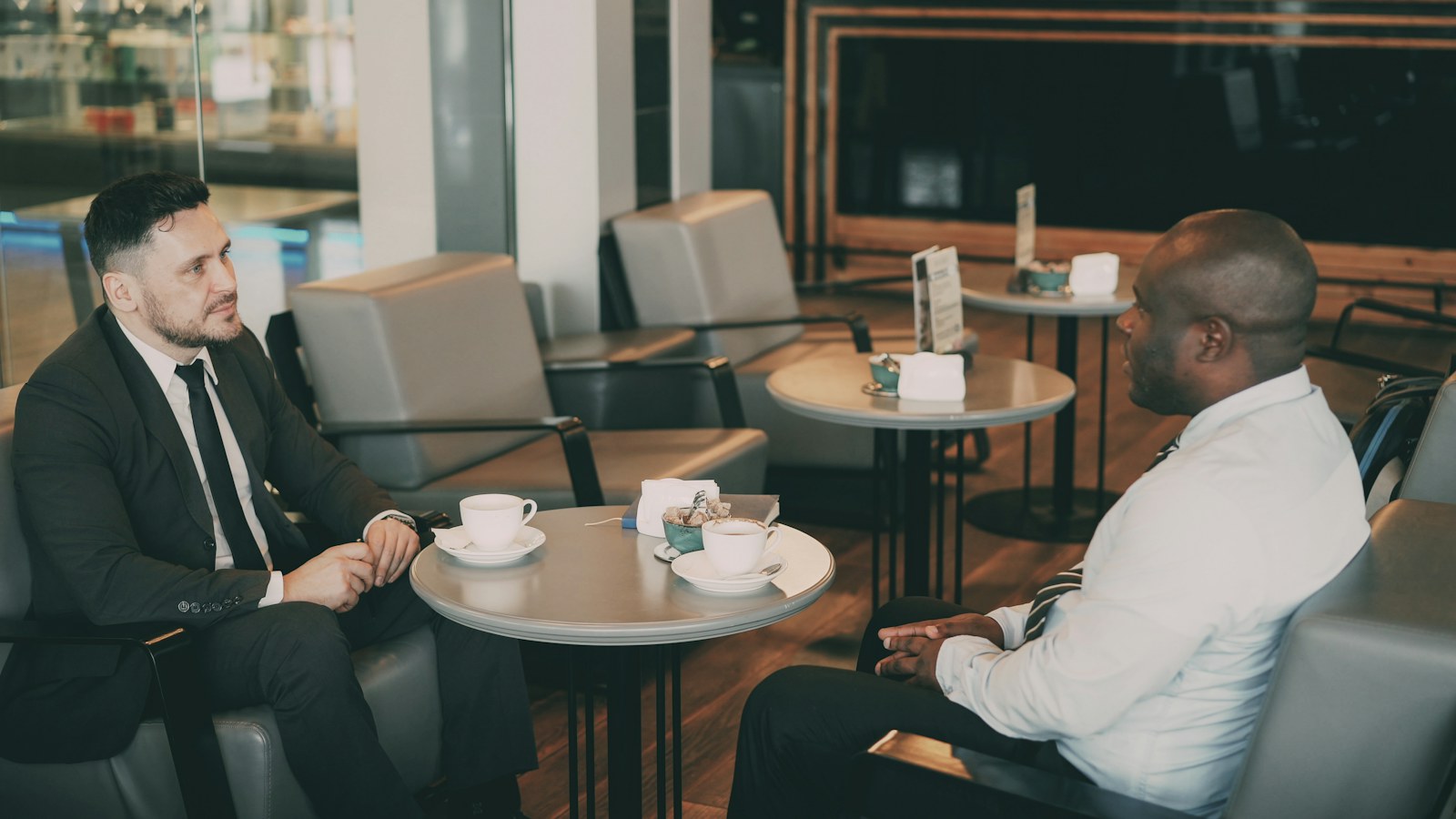 Two professionals having a focused conversation
